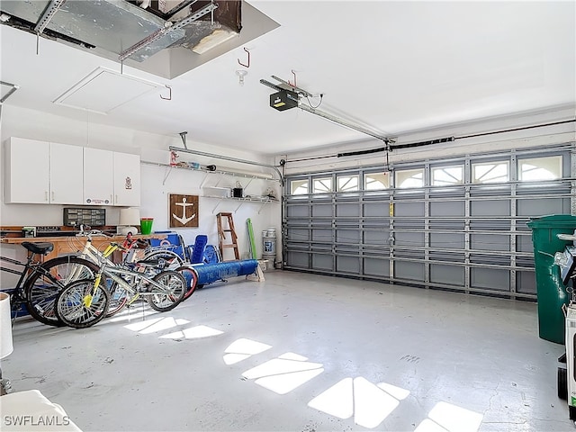 garage featuring a garage door opener