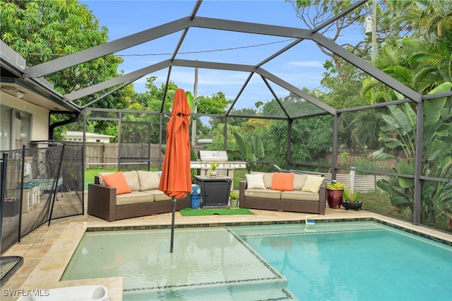 view of swimming pool featuring a patio area, glass enclosure, and outdoor lounge area