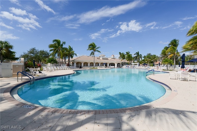 view of pool featuring a patio area