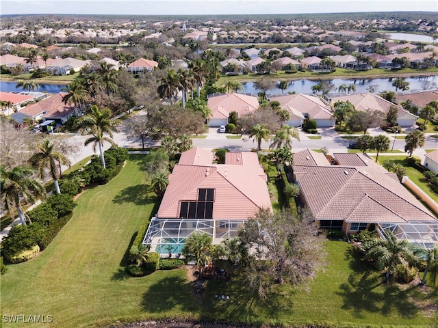 drone / aerial view with a water view