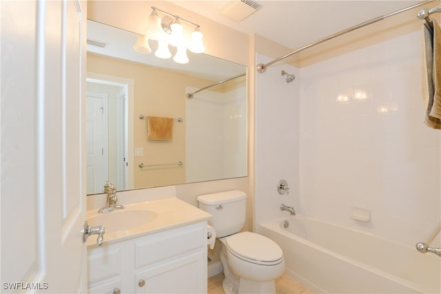 full bathroom with toilet, vanity, tiled shower / bath, and tile patterned flooring