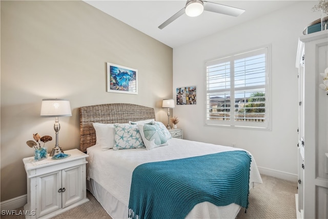 carpeted bedroom featuring ceiling fan