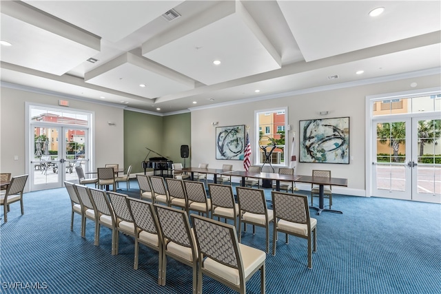 carpeted dining area with french doors, plenty of natural light, and ornamental molding