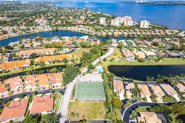 birds eye view of property featuring a water view