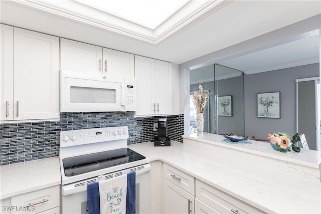 kitchen with white cabinetry, backsplash, electric range, and light stone counters