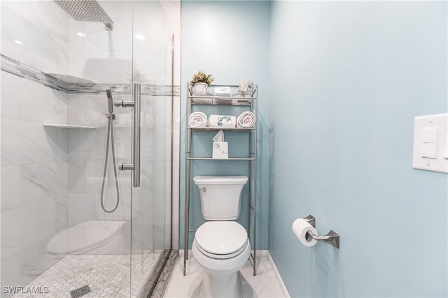 bathroom with toilet and walk in shower