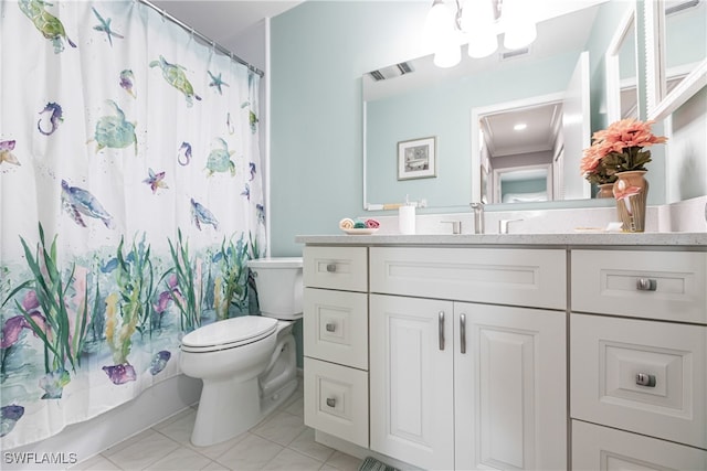 full bathroom featuring vanity, shower / tub combo, toilet, and tile patterned flooring