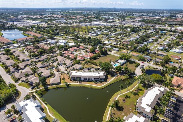 drone / aerial view with a water view