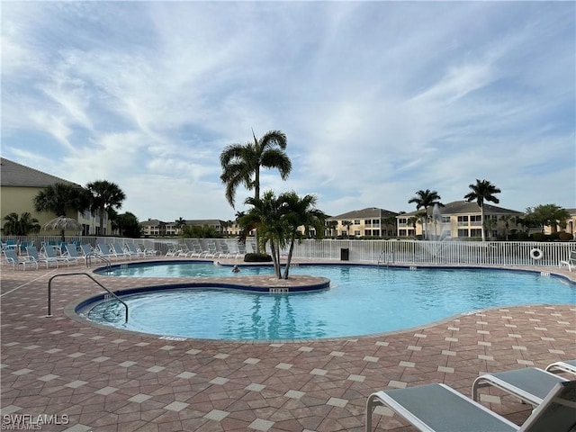 view of pool featuring a patio