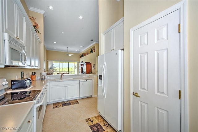 kitchen featuring white appliances, crown molding, white cabinetry, and sink