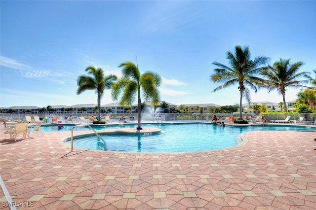 view of pool featuring a patio area