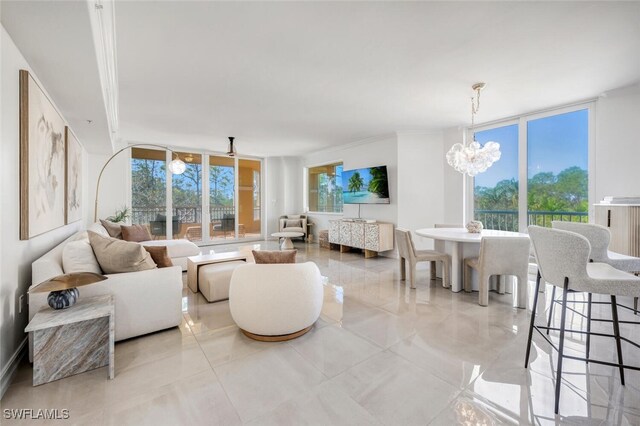 tiled living room with expansive windows, a chandelier, and a wealth of natural light