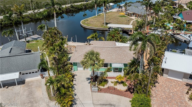 drone / aerial view featuring a water view