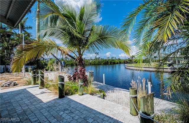 view of patio with a water view