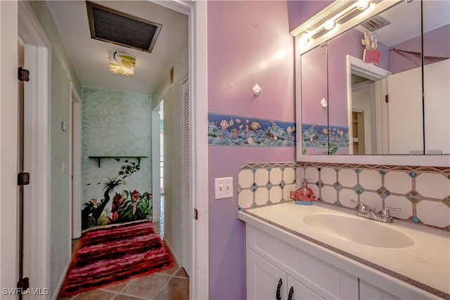 bathroom with vanity and tile patterned floors