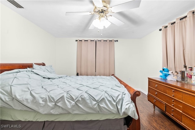 bedroom featuring dark wood-type flooring and ceiling fan