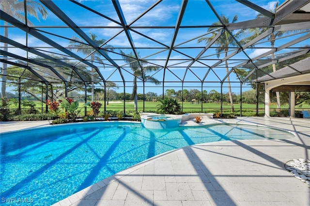 view of swimming pool featuring a patio, glass enclosure, and an in ground hot tub