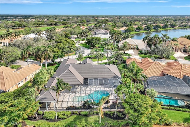 drone / aerial view with a water view