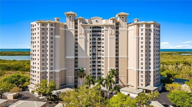 view of building exterior featuring a water view