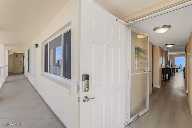 hallway featuring a wealth of natural light