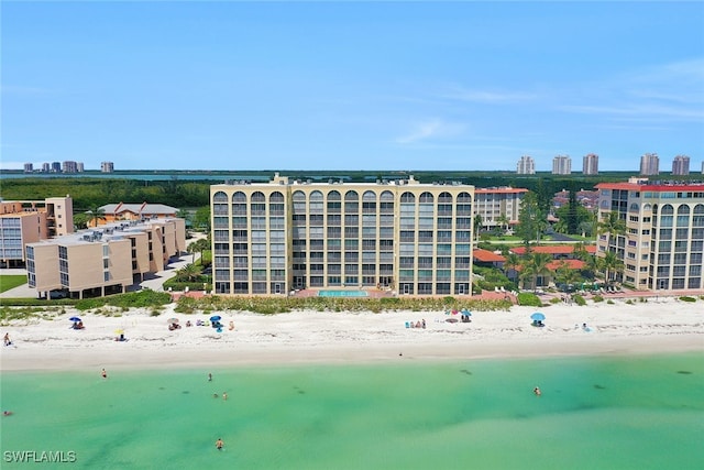 aerial view with a beach view and a water view