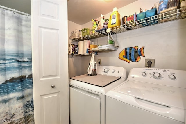 laundry room featuring washing machine and dryer