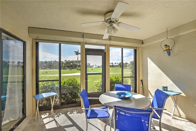 sunroom / solarium with ceiling fan