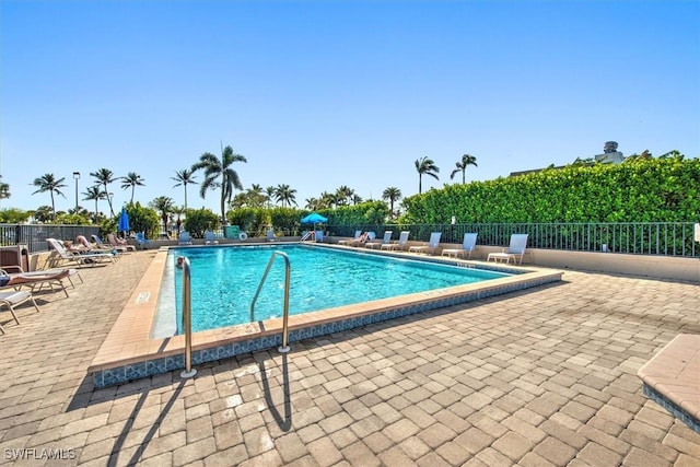 view of swimming pool with a patio area