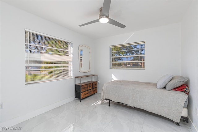 bedroom featuring ceiling fan