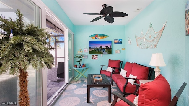 living room featuring ceiling fan