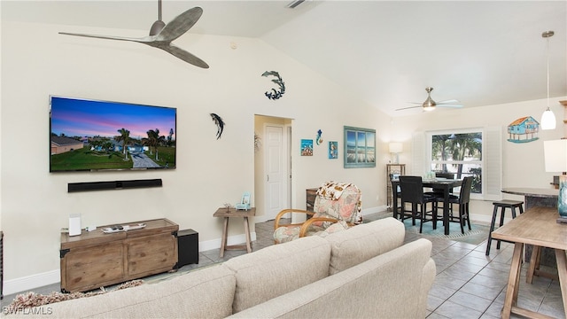 living room featuring ceiling fan, light tile patterned floors, and high vaulted ceiling