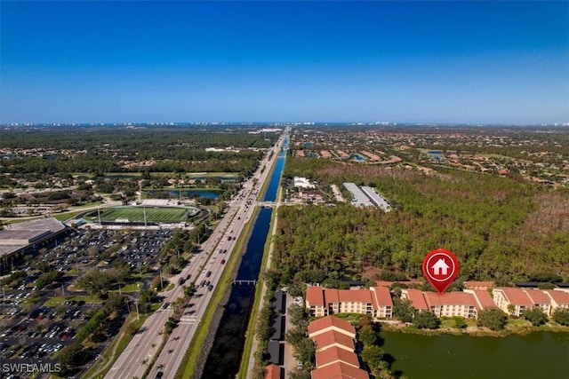 7925 Preserve Cir Unit 333, Naples, FL 34119 - aerial view of property and surrounding area featuring a highway and a nearby body of water