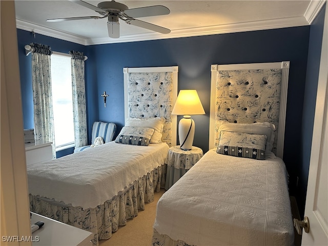 carpeted bedroom with ceiling fan and crown molding