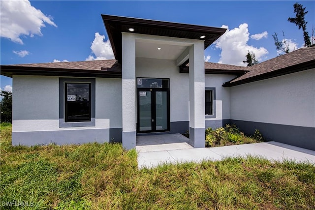 view of exterior entry with french doors