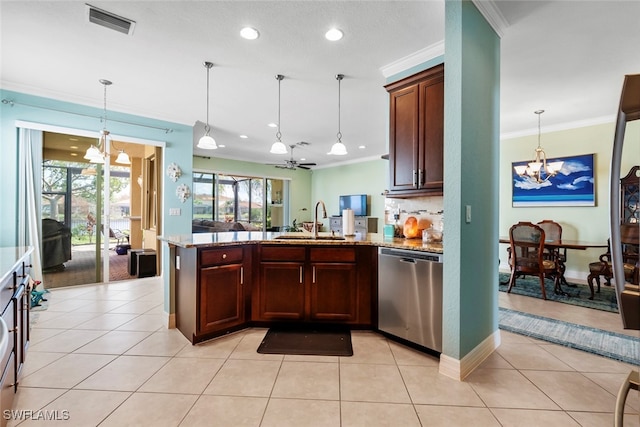 kitchen featuring sink, pendant lighting, dishwasher, and light stone counters