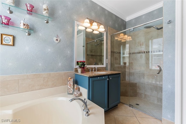 bathroom with tile patterned floors, vanity, crown molding, and plus walk in shower