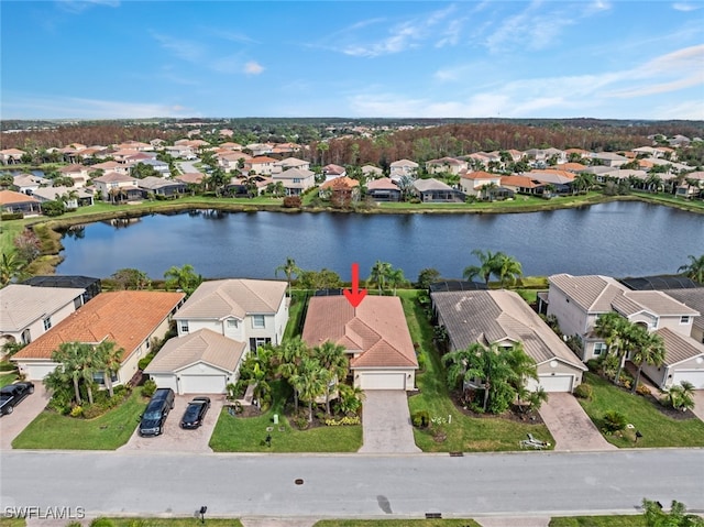 drone / aerial view featuring a water view