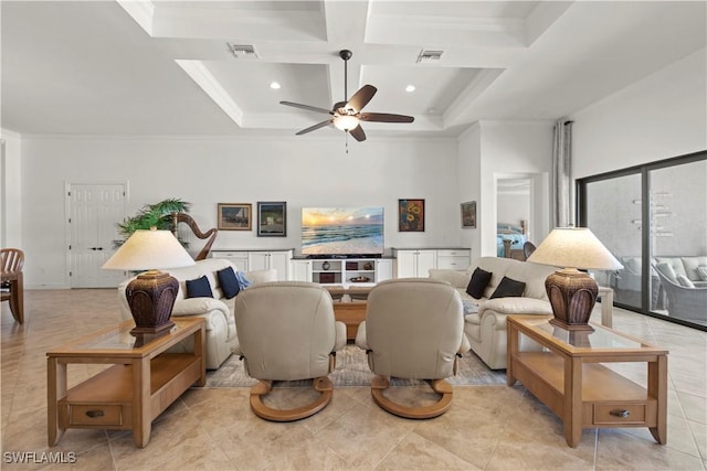 living room with a high ceiling, coffered ceiling, visible vents, a ceiling fan, and ornamental molding