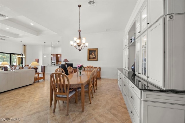 dining area featuring baseboards, visible vents, ornamental molding, a chandelier, and recessed lighting