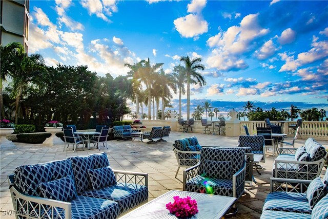 view of patio with outdoor lounge area and a mountain view