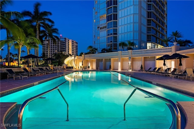 view of swimming pool featuring a patio area