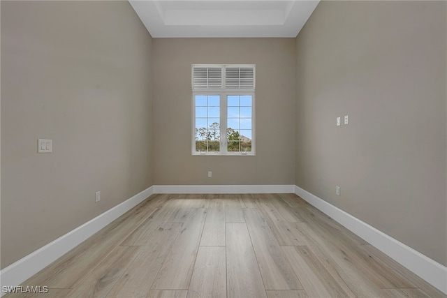 unfurnished room featuring light hardwood / wood-style flooring