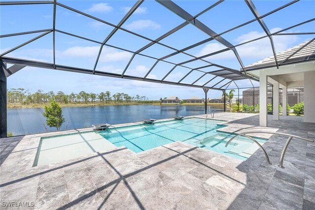 view of swimming pool featuring a patio area, a lanai, and a water view