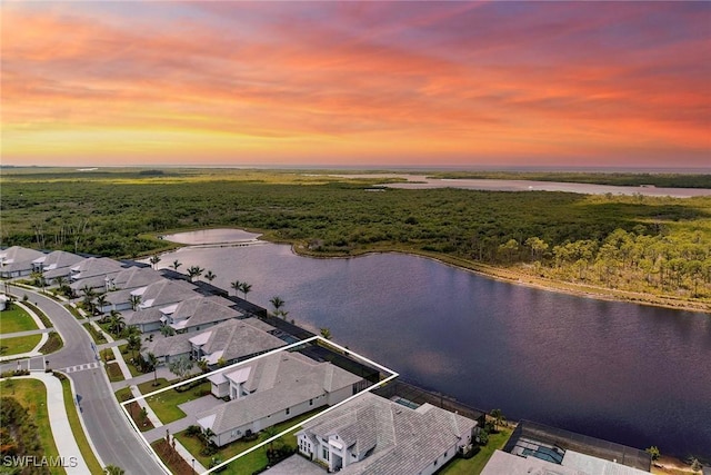 8871 Nevis Way, Naples, FL 34112 - bird's eye view featuring a water view and a wooded view