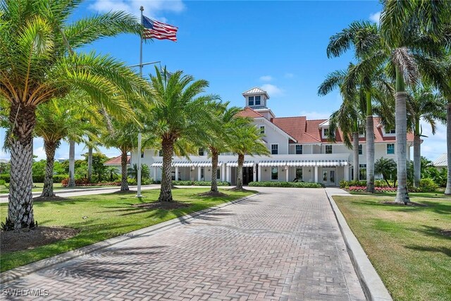 8871 Nevis Way, Naples, FL 34112 - view of home's community with a lawn
