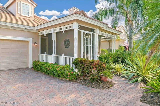 view of property exterior with a garage