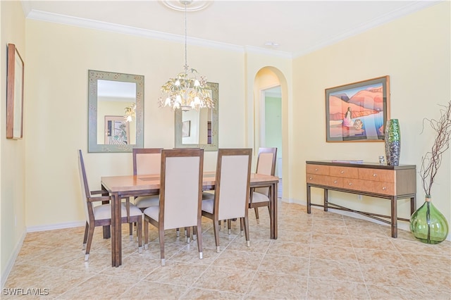 tiled dining space featuring crown molding and a chandelier