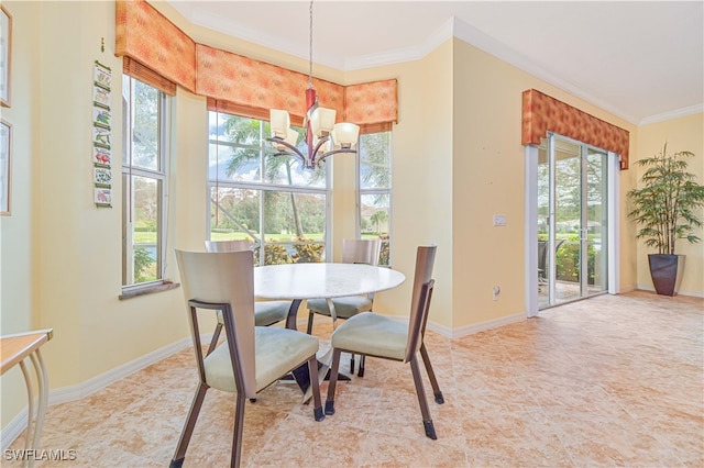 dining space with ornamental molding and an inviting chandelier