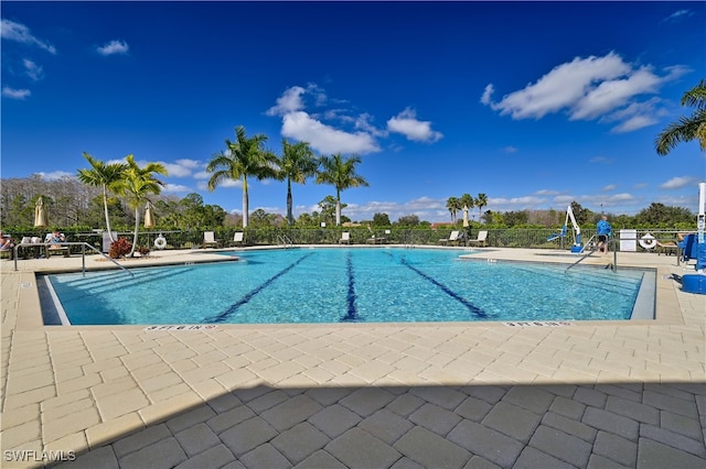 view of swimming pool featuring a patio