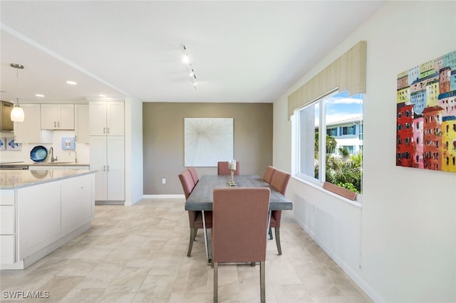 dining area with rail lighting